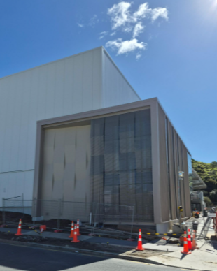 Outside cladding and solar panels with woven design Grace Removals' new building in Porirua, Wellington Sept 2026